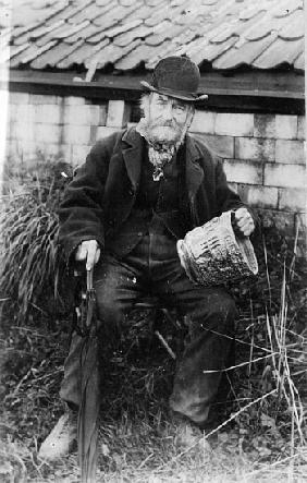 Edward Bingham holding one of his Castle Hedingham Ware designs