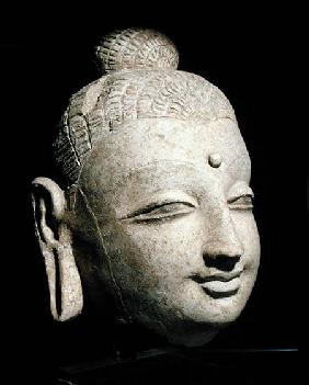 Head of a smiling Buddha, Greco-Buddhist style, from Afghanistan 1st-4th ce