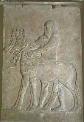 Relief of a man holding the reins of four horsesfrom the Palace of Sargon II (721-705 BC) at Khorsab 8th centur