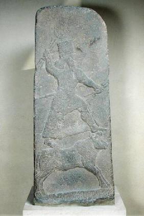 Stele depicting the storm-god Adad standing on his bull and brandishing lightning bolts, from the Te Arslan Tas