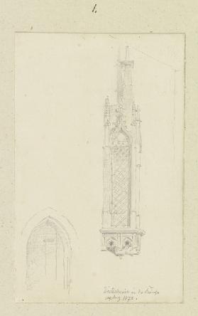 Fliesen sowie ein Wappen im Scheitel einer spitzbogigen profilierten Wandöffnung in St. Martin in Sa