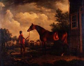 A hunter and groom outside a country house 1816