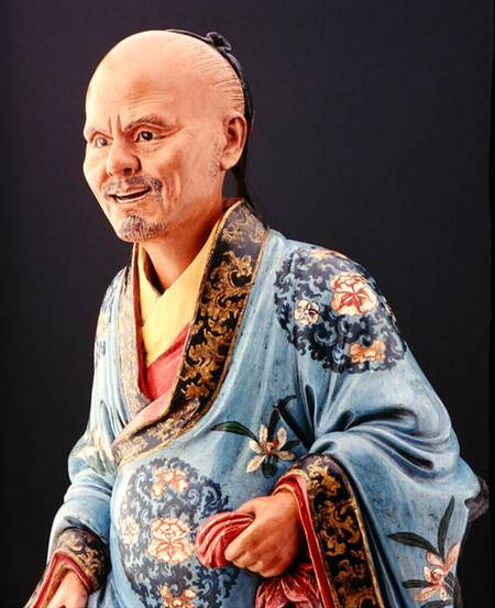 A seated nodding figure of a man von Chinese School