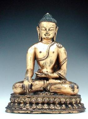 A Chinese gilt bronze figure of the Buddha in meditation