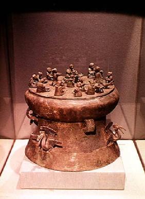 Cowrie container decorated with peacocks and human figures, from Tomb 1, Shih-chai-shan, Yunnan, Wes 2nd-1st ce