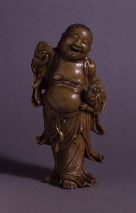 Laughing Figure of Liu Hai, with a three legged toad under his left arm, Qing dynasty 19th centu