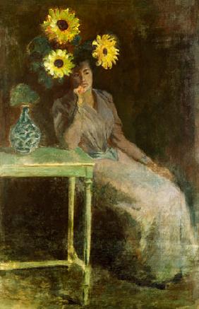 Sitzende Frau neben einer Vase mit Sonnenblumen