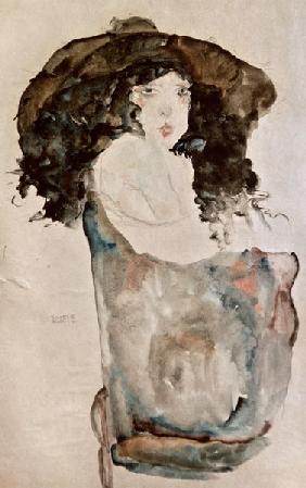 Mädchen mit blauschwarzem Haar und Hut. 1911