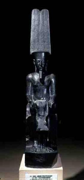 Statue of the god Amun protecting Tutankhamun, Egyptian, New Kingdom c.1347-37
