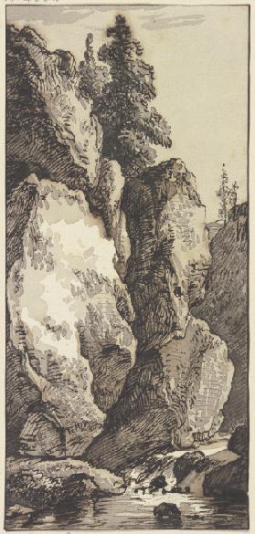 Steile Felspartie bei einem Bach