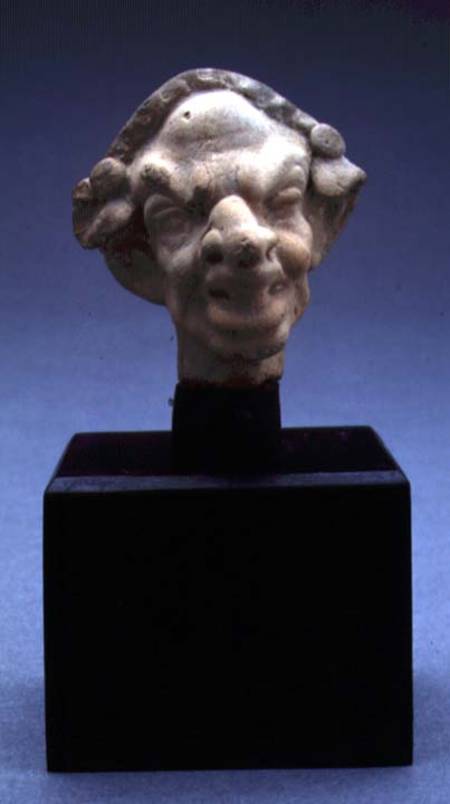 Grotesque head of a woman von Greek