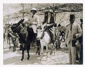 Lady Ribblesdale and Mr Stephen Vlasto arriving on donkeys at the Tomb of Tutankhamun, Valley of the