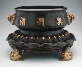 Censer and stand with buddhist characters in relief resting on four frog feet c.1600 rti