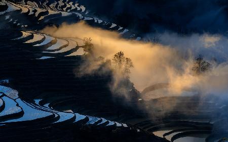 Sonnenuntergang auf den Reisterrassen von Yuanyang
