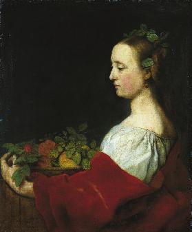Frau mit Fruchtkorb