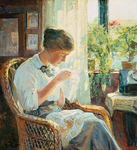 Nähende junge Frau am Fenster 1914