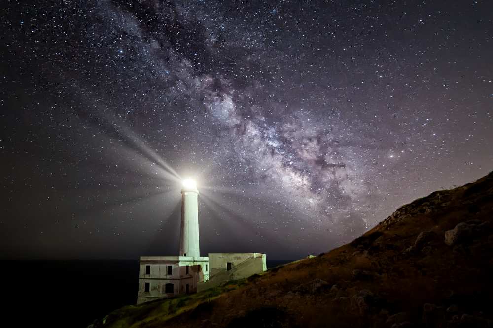 The lighthouse and the Milky Way von Luigi Chiriaco