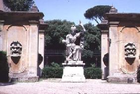 View of the garden, detail of a gateway decorated with grotesque masks and a statue of a goddess, de