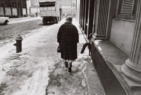 Lady Walking towards Canal Street on a Snowy Street, Untitled 39 von Nat Herz