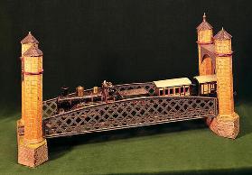 31:Part of a bridge and a Gauge 1 clockwork train by Bing of Nuremberg, c.1905