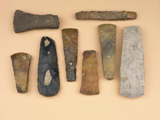 Collection of Neolithic to early Bronze Age weapon heads including Scandinavian stone battle and Dan von 
