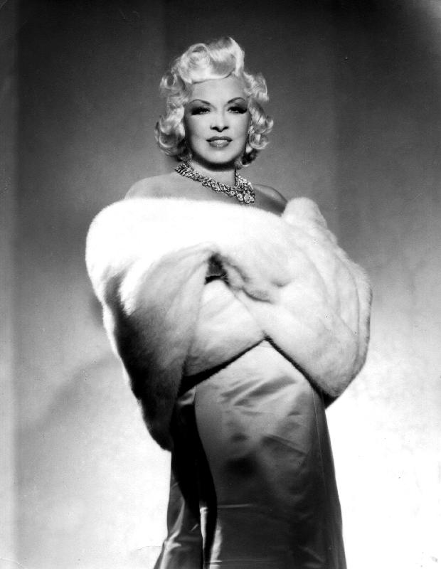 American Actress Mae West with fur stole von 