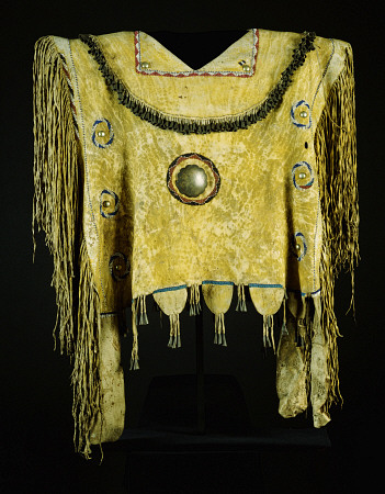 An Apache Beaded And Fringed Buckskin Poncho, Painted With Yelloe Ochre And Decorated With Tin Cones von 