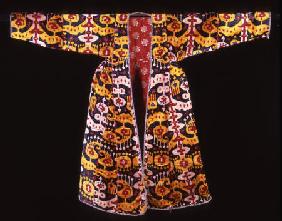 A Coat Of Silk Velvet Ikat,  Woven With Rams horns And Combed Motifs Against A Deep Green Ground, 18