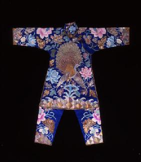 A High Collared Jacket And Matching Leggings Of Dark Blue Satin, Heavily Embroidered With A Large Pe