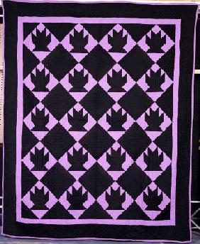 An Amish Pieced & Quilted Cotton Coverlet Worked In 20 Blocks Of Basket Pattern