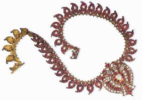 An Indian Ruby And Diamond Necklace With a Centre-Piece Designed As A Double-Peacock and Set With Ta