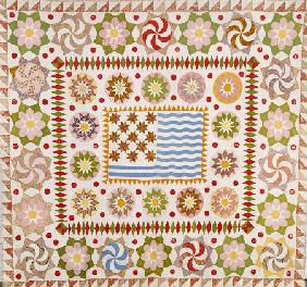 A Pieced And Appliqued Cotton Quilted Coverlet,