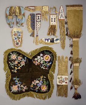 A Selection Of Native American Artefacts Including A Pair Of Sioux Beaded Moccasins And Skin Mirror