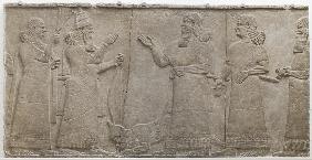 Carved relief of Tiglath-Pileser III receiving homage from a vanquished warrior, south-west palace,  745-727 BC