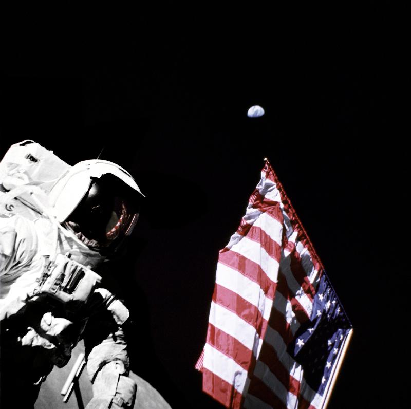 Geologist-Astronaut Harrison Schmitt, Apollo 17 Lunar Module pilot, is photographed next to the Amer von 
