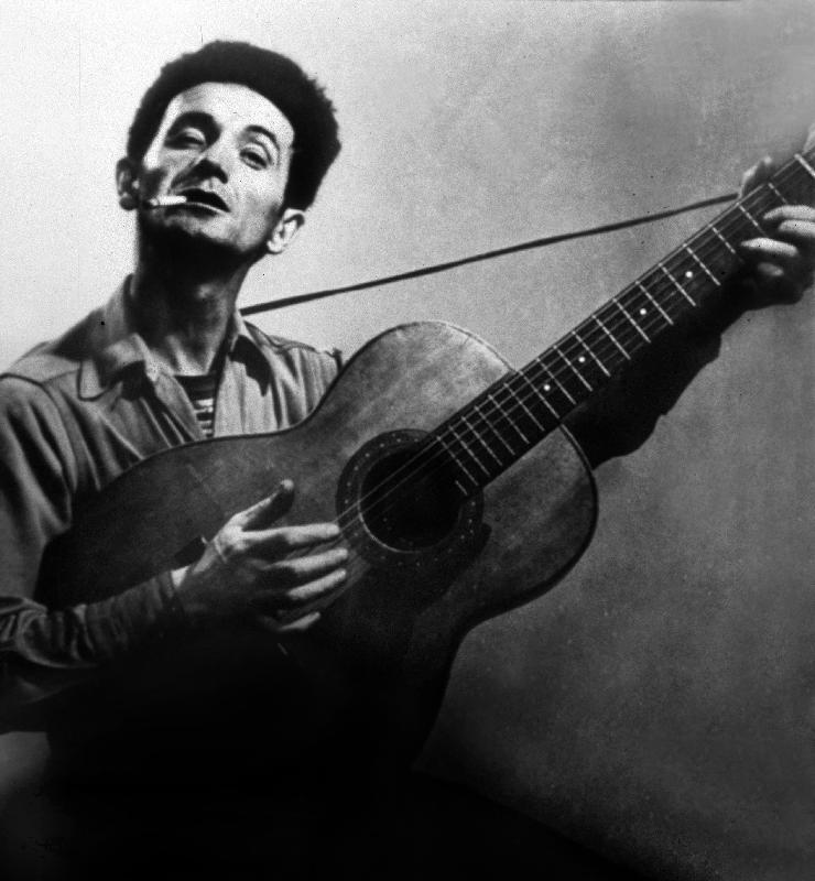 Musician Woody Guthrie considered as the father of folk music von 