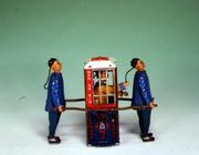 `Mandarin'in a Chinese sedan chair, a Lehmann clockwork toy, German (tinplate) 16th