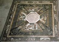 Mosaic pavement based round an octagonal basin, depicting the seasons and hunting scenes, from the C 1565