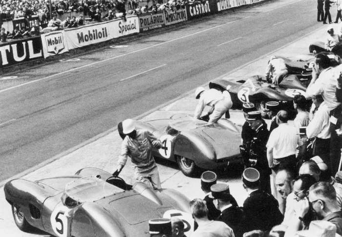 Start of the Le Mans 24 Hours, France, 1959. Roy Salvadori prepares to climb aboard his Aston Martin von 