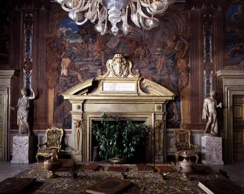 The entrance hall, detail of the fireplace decorated with the coat of arms of Cardinal Pietro Aldobr von 