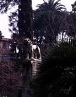 View of the garden with a statue of a lion (photo) C18th