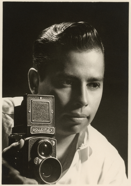 Orlando Suero portrait with Rolleiflex camera, c von Orlando Suero