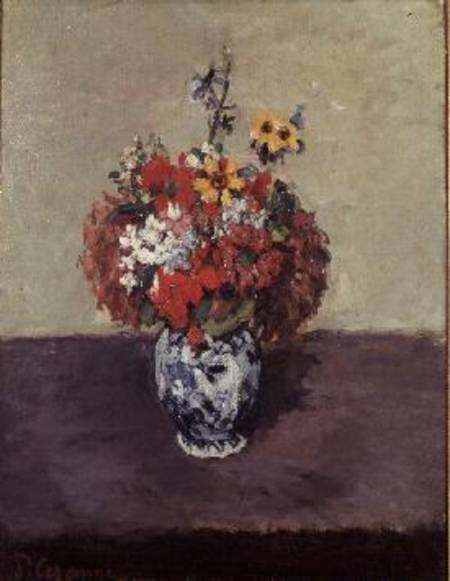 Flowers in a Delft vase von Paul Cézanne