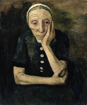 Sitzende alte Frau