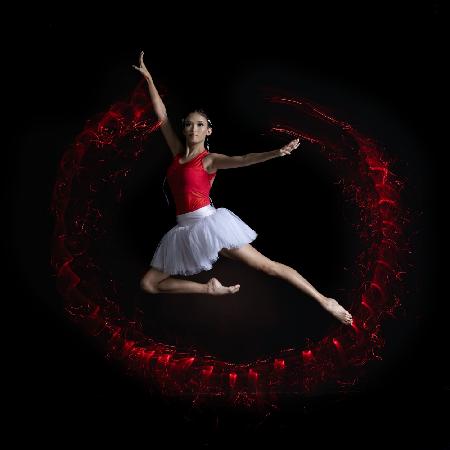 Ballerina mit Rotlichtlampe