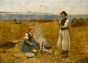 Ungarisches Bauernpaar beim Bereiten des Abendmahls.