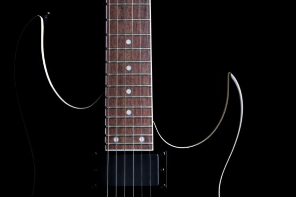 electric guitar silhouette isolated on b von Sascha Burkard