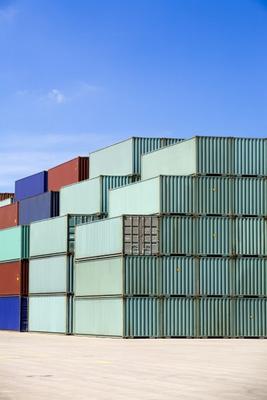 shipping containers against blue sky von Sascha Burkard