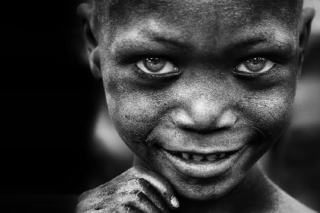 Kinderlächeln,Bergmannshände – Benin