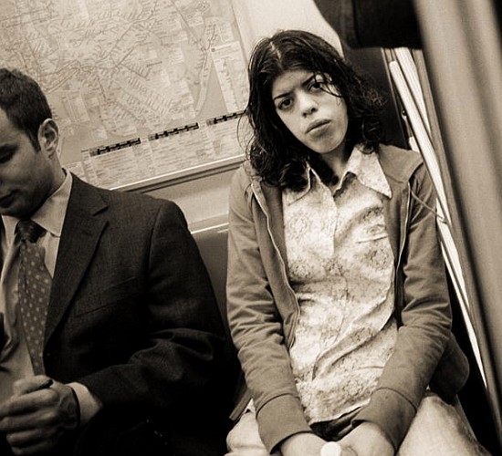 Woman sitting on a subway and staring, 2004 (b/w photo)  von Stephen  Spiller